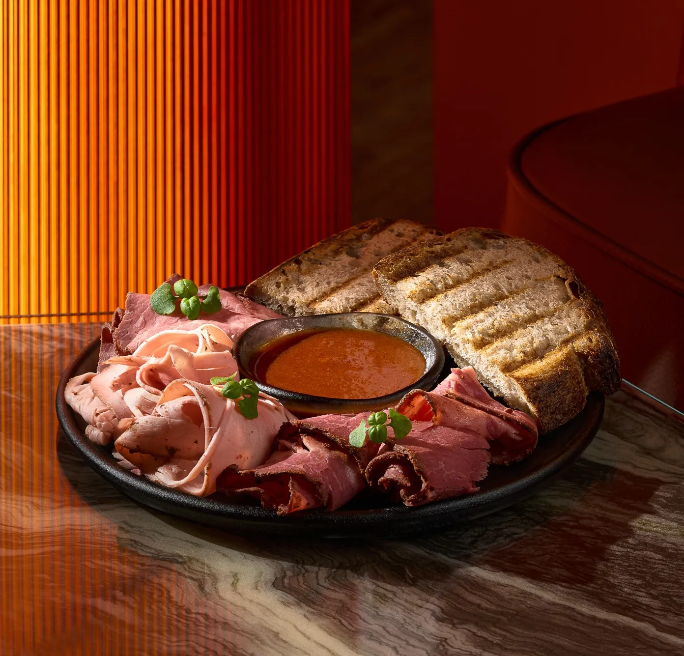 MEAT PLATE with smoked plum barbecue sauce